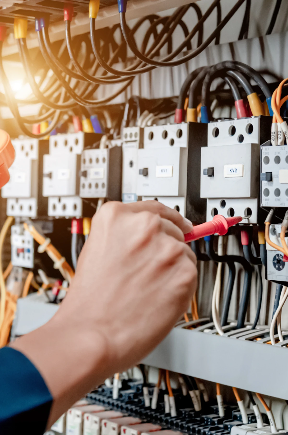 Technician fixing electrical wiring