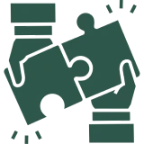 Hands holding puzzle pieces